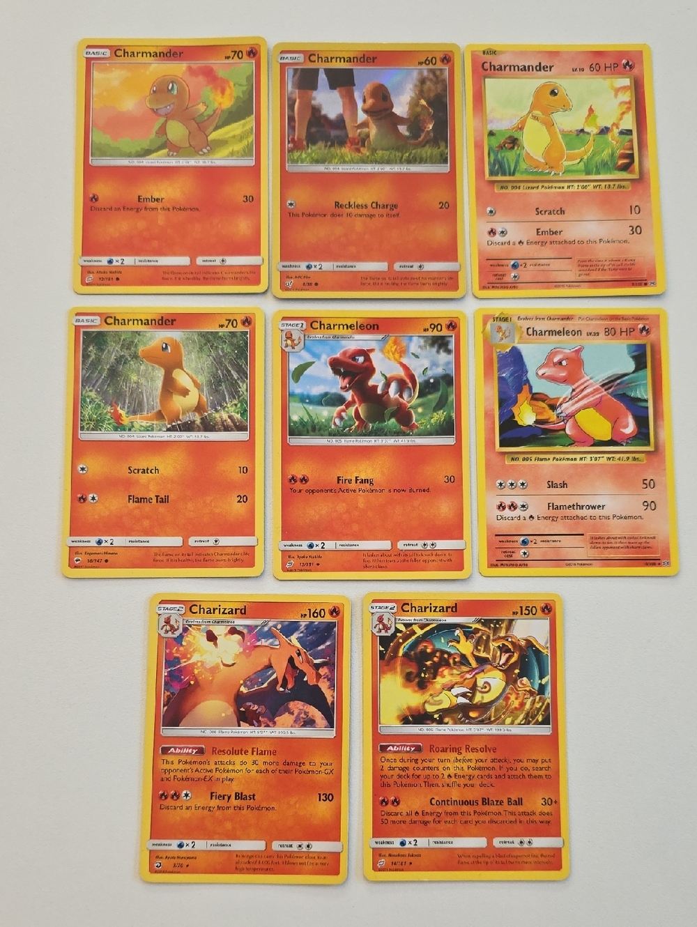 Pokemon Charmander, Charmeleon, And Charizard Trading Cards